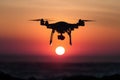 Silhouetted quadrocopters against sunset backdrop, capturing aerial view