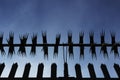 Silhouetted Security Fence Royalty Free Stock Photo