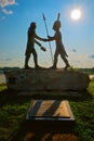 Silhouetted Statue of Lewis and Clark Shaking Hands at the Falls of the Ohio River Royalty Free Stock Photo