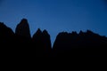 A silhouetted view of the three towers at the end of the W walk in Torres del Paine National Park Royalty Free Stock Photo