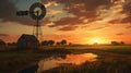 Silhouetted windmill at sunset Royalty Free Stock Photo