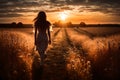 Silhouetted Young Woman Walks Into Beautiful Sunset