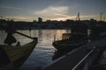 Silhouettes of ancient boats on the Douro River at night in the center of the old city of Porto, Portugal Royalty Free Stock Photo