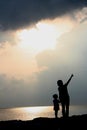 Silhouettes on the Beach at Sunset Royalty Free Stock Photo