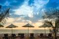 Silhouettes of beach umbrellas sunset and sky Royalty Free Stock Photo