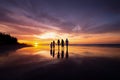 Silhouettes of big happy family holding the hands on beach during sunset Royalty Free Stock Photo