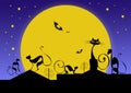 Silhouettes of black cats and bats against moon Royalty Free Stock Photo