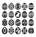 Silhouettes of black easter eggs isolated on white background. Holiday Easter Eggs decorated with flowers, rabbit, leafs. Easter Royalty Free Stock Photo