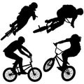 Silhouettes of BMX Bike Riders Royalty Free Stock Photo