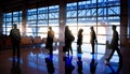 Silhouettes of Business People in Airport Royalty Free Stock Photo