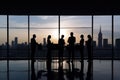 Silhouettes of business people in blurred meeting room. Business teamwork concept. Group of Business People Working in Royalty Free Stock Photo