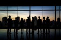 Silhouettes of business people in blurred meeting room. Business teamwork concept. Group of Business People Working in Royalty Free Stock Photo