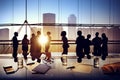 Silhouettes of Business People Brainstorming Inside the Office