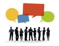 Silhouettes of Business People Discussing with Speech Bubbles Royalty Free Stock Photo