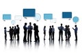Silhouettes of Business People Discussing with Speech Bubbles Royalty Free Stock Photo