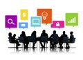 Silhouettes of Business People in a Meeting and Internet Symbols Royalty Free Stock Photo