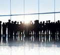 Silhouettes of Business People in an Office Building Royalty Free Stock Photo