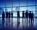 Silhouettes of Business People in an Office Building Royalty Free Stock Photo