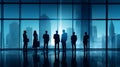 Silhouettes of Business People in an Office Building Royalty Free Stock Photo