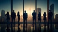 Silhouettes of Business People in an Office Building Royalty Free Stock Photo