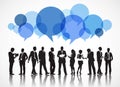 Silhouettes of Business People and Speech Bubbles Royalty Free Stock Photo