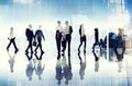 Silhouettes of Business People Walking inside the Office Royalty Free Stock Photo