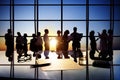 Silhouettes of Business People Working in Board Room Royalty Free Stock Photo