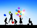 Silhouettes of Cheerful Children Royalty Free Stock Photo