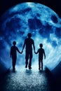 Silhouettes of children and adult are before the moon