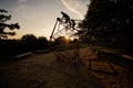 Silhouettes of children play in rope polyhedron climb at playground outdoor Royalty Free Stock Photo