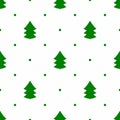 Silhouettes of Christmas tree and polka dot. Simple seamless pattern. Green elements on white background. Royalty Free Stock Photo