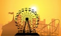 Silhouettes of a city and amusement park