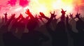 Silhouettes of concert crowd with hands raised at a music disco Royalty Free Stock Photo