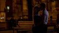 Silhouettes of couple kissing in city park, feeling love emotions at first date Royalty Free Stock Photo