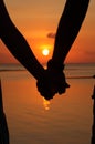 Silhouettes couples hands