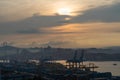 Silhouettes of cranes in the seaport of Vladivostok, the largest year-round port in Russian Far East. Royalty Free Stock Photo