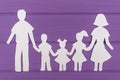 The silhouettes cut out of paper of man and woman with two girls and boy Royalty Free Stock Photo