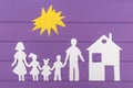 The silhouettes cut out of paper of man and woman with two girls and boy under the sun, house near Royalty Free Stock Photo