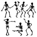 Silhouettes of dancing skeletons.