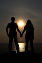 The silhouettes depict the love of couples with beautiful sunset backdrop.