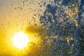 Silhouettes of drops falling water fountain in the setting sun Royalty Free Stock Photo