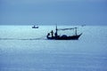 silhouettes fishermen in boat Royalty Free Stock Photo