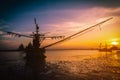 Silhouettes fishing boat and tree at sunset time, Phuket, Thailand. Royalty Free Stock Photo