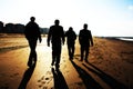 Silhouettes Golden beach Royalty Free Stock Photo