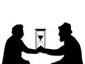 Silhouettes of grandparents holding hourglass time symbol