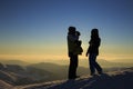 Silhouettes of the hikers in the Carpathian mountains