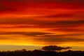 Silhouettes of hills under a cloudy sky during a beautiful sunset in Patagonia, Argentina Royalty Free Stock Photo