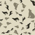 Silhouettes of howling wolves on a brown background seamless pattern. Hand-drawn vector illustration