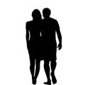 Silhouettes of hugging couple