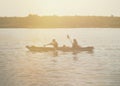 Kayakers at dusk. Royalty Free Stock Photo